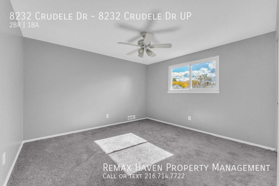 8232 Crudele Dr | UP, Garfield Heights- Spacious 2-bed 1-bath multi-fa property image