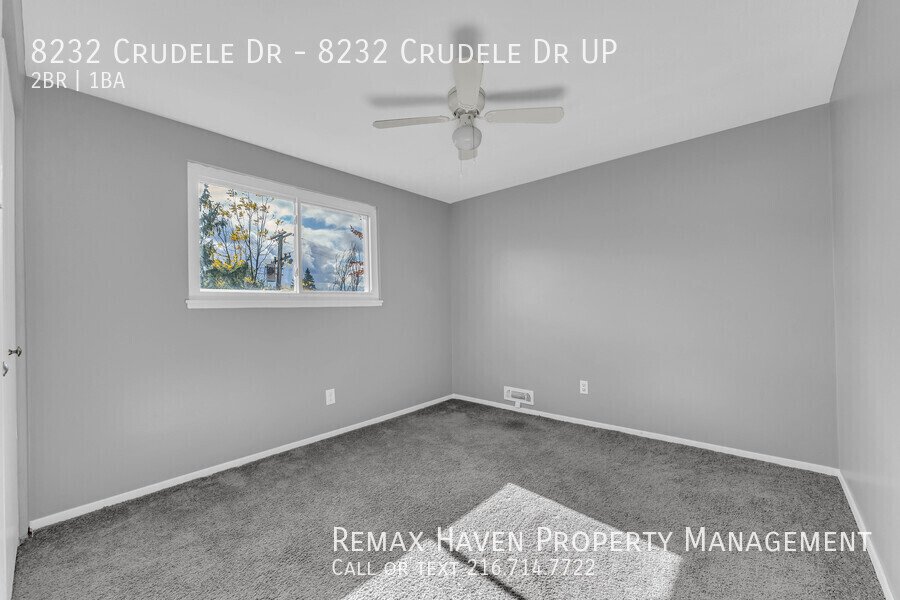 8232 Crudele Dr | UP, Garfield Heights- Spacious 2-bed 1-bath multi-fa property image