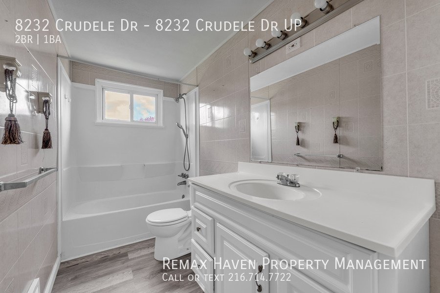 8232 Crudele Dr | UP, Garfield Heights- Spacious 2-bed 1-bath multi-fa property image