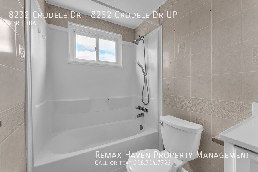 8232 Crudele Dr | UP, Garfield Heights- Spacious 2-bed 1-bath multi-fa property image