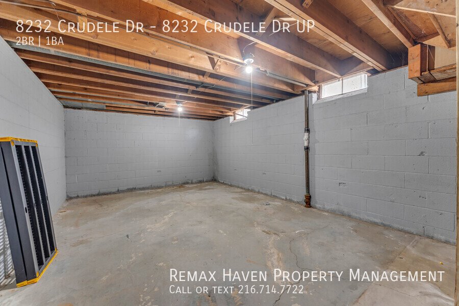 8232 Crudele Dr | UP, Garfield Heights- Spacious 2-bed 1-bath multi-fa property image