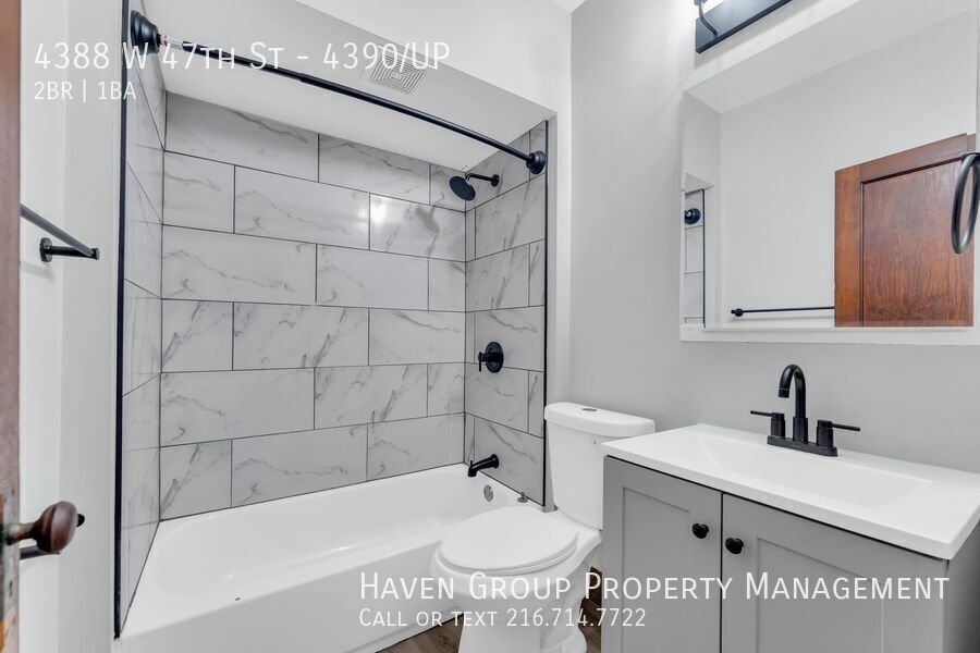 4388 W 47th St | UP, Cleveland - Bright Upstairs Unit with Charming Front Porch! property image