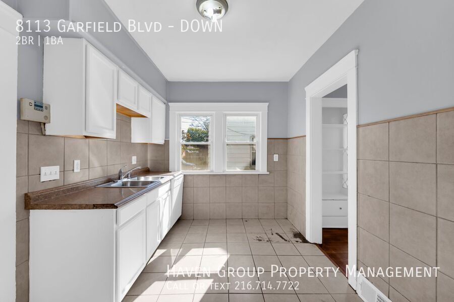 8113 Garfield Blvd | DN, Garfield Heights - Spacious 2-bed 1-bath multi-family home! property image
