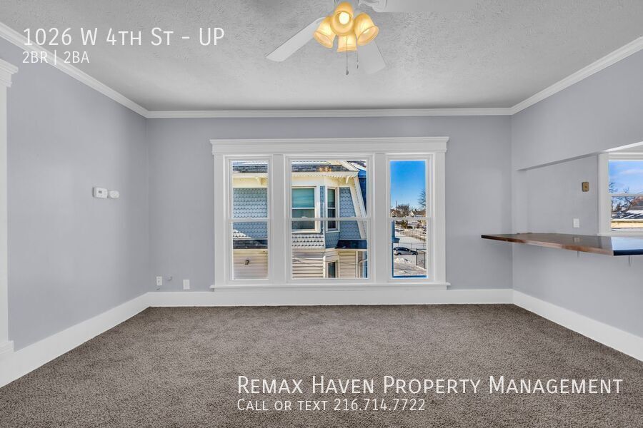 1026 W 4th St | UP, Lorain - Spacious 2-bed 1.5-bath multi-family home!  property image