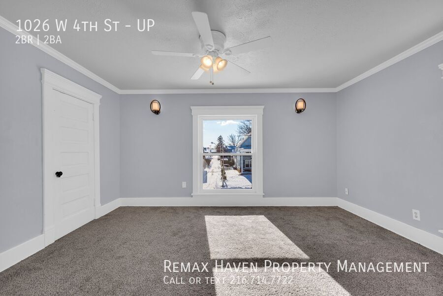 1026 W 4th St | UP, Lorain - Spacious 2-bed 1.5-bath multi-family home!  property image