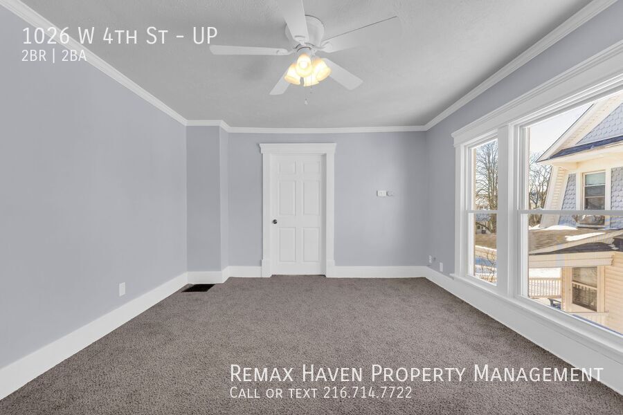 1026 W 4th St | UP, Lorain - Spacious 2-bed 1.5-bath multi-family home!  property image