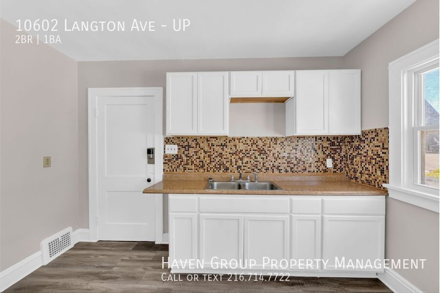 10602 Langton Ave | UP, Garfield Heights, Ohio, 44125 - Spacious 2-bed 1-bath multi-family home! property image