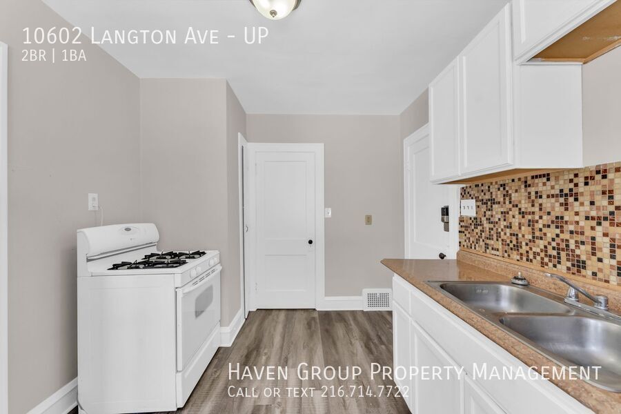 10602 Langton Ave | UP, Garfield Heights, Ohio, 44125 - Spacious 2-bed 1-bath multi-family home! property image