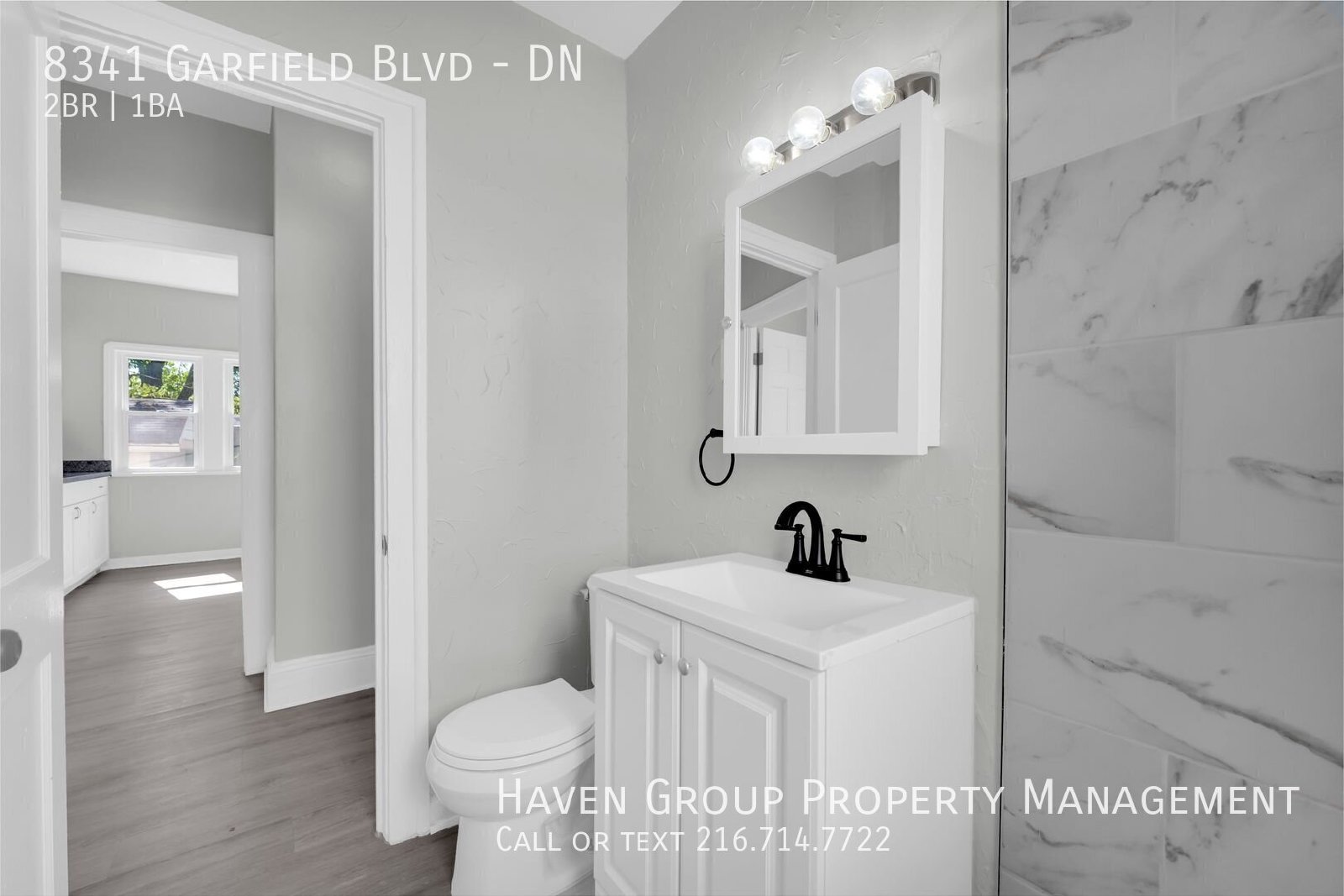 8341 Garfield Blvd | DN, Garfield Heights, OH 44125 - Spacious 2-bed 1-bath multi-family home!   property image